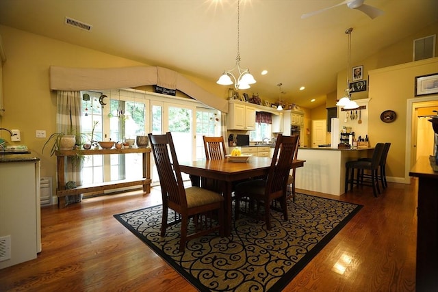 895 Dennison Dr, Southbridge, MA 01550 - dining area featuring lofted ceiling, dark wood-style floors, a chandelier, ceiling fan, and recessed lighting