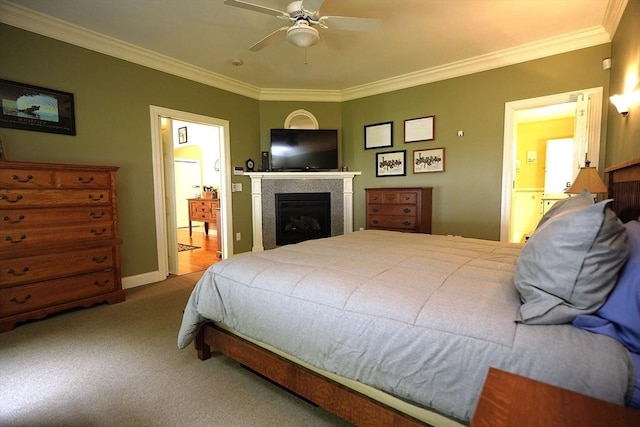 895 Dennison Dr, Southbridge, MA 01550 - bedroom with crown molding, a glass covered fireplace, carpet, and a ceiling fan