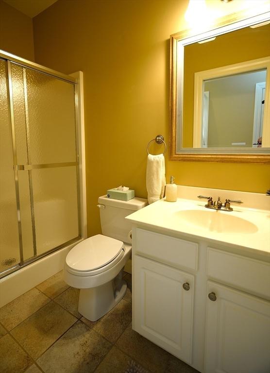 895 Dennison Dr, Southbridge, MA 01550 - bathroom with vanity and a shower stall