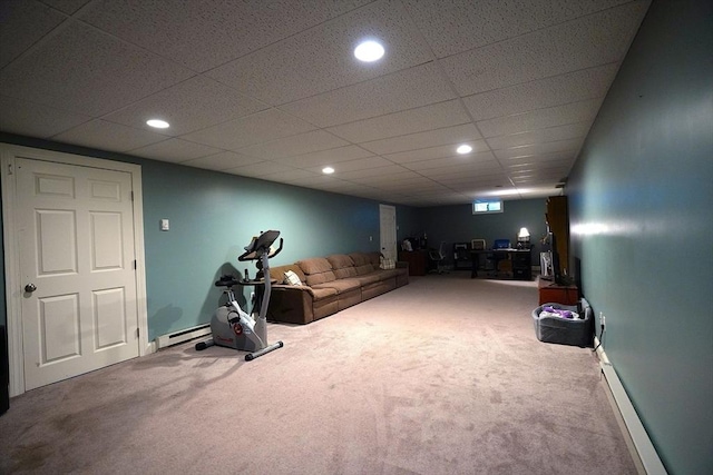 895 Dennison Dr, Southbridge, MA 01550 - carpeted living area with a baseboard heating unit, recessed lighting, a desk, and a paneled ceiling