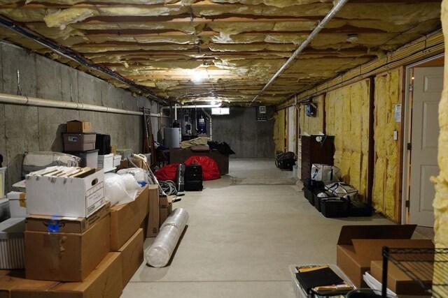 895 Dennison Dr, Southbridge, MA 01550 - unfinished basement with gas water heater
