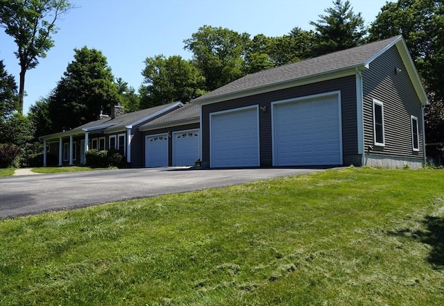 895 Dennison Dr, Southbridge, MA 01550 - view of front of property with a front lawn and driveway