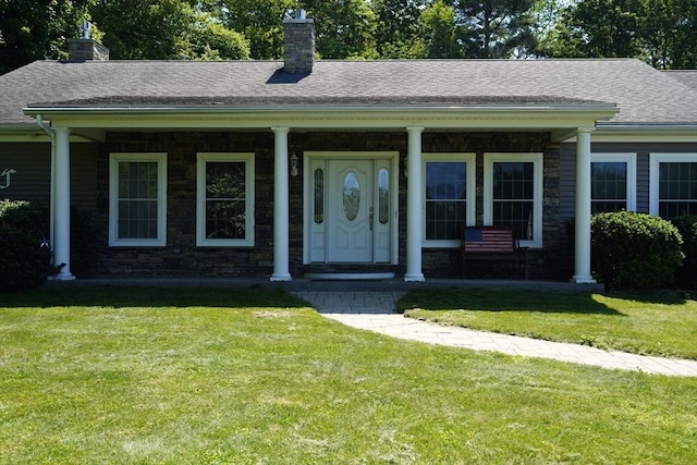 895 Dennison Dr, Southbridge, MA 01550 - ranch-style home featuring a chimney, a front yard, and covered porch