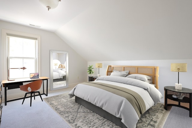 bedroom featuring carpet and vaulted ceiling