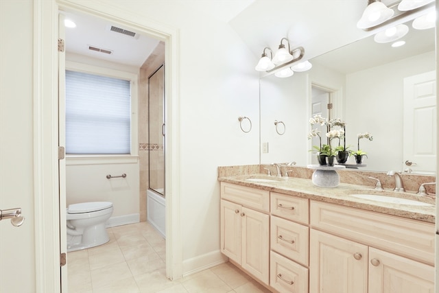 full bathroom with toilet, tile patterned floors, combined bath / shower with glass door, and double vanity