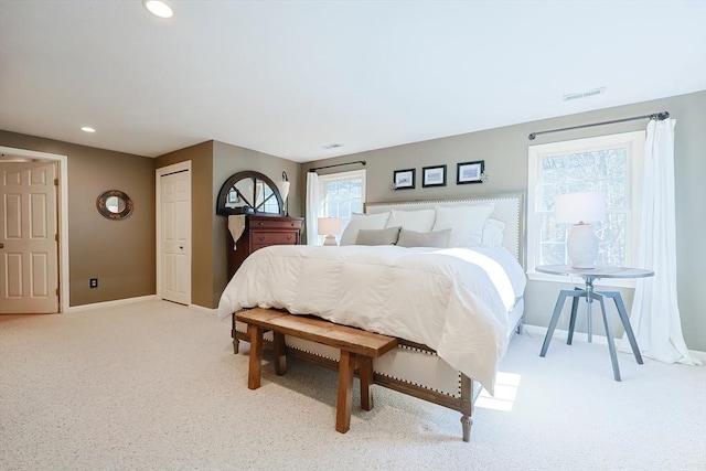 bedroom featuring visible vents, recessed lighting, carpet, and baseboards