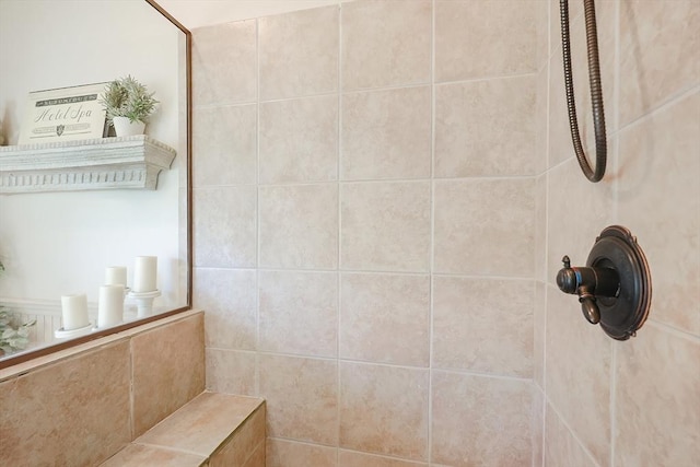 full bath featuring tiled shower