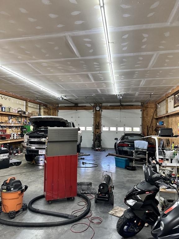 garage with a workshop area