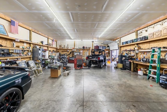 garage with a workshop area