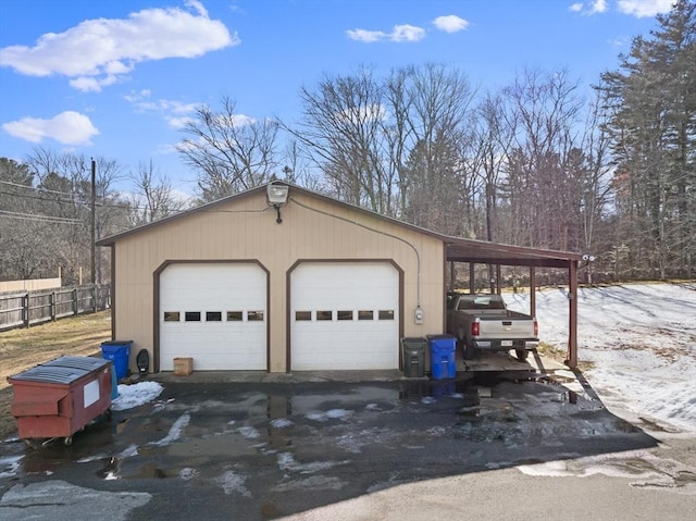 view of snow covered garage