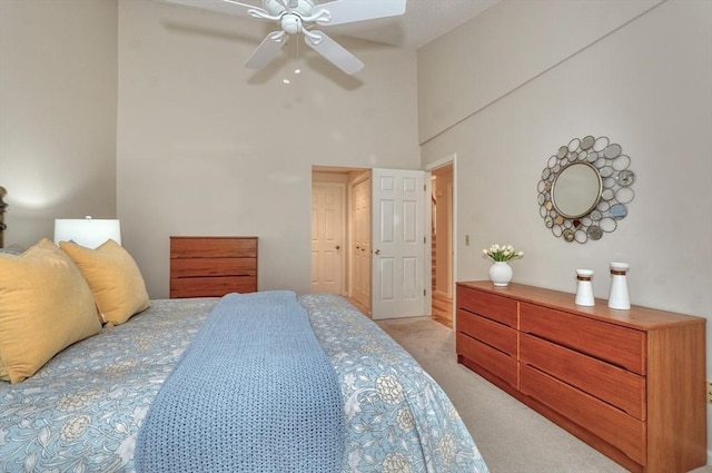 9 Knollwood Ct Unit 9, Burlington, MA 01803 - bedroom featuring light colored carpet, a towering ceiling, and ceiling fan