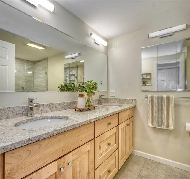 9 Knollwood Ct Unit 9, Burlington, MA 01803 - full bath featuring baseboards, double vanity, tiled shower, and tile patterned flooring