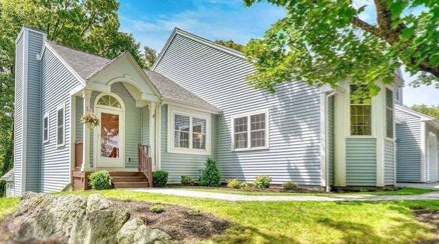 9 Knollwood Ct Unit 9, Burlington, MA 01803 - view of front of house featuring a chimney, a shingled roof, and a front lawn