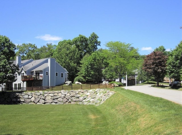 9 Knollwood Ct Unit 9, Burlington, MA 01803 - view of green lawn with a wooden deck