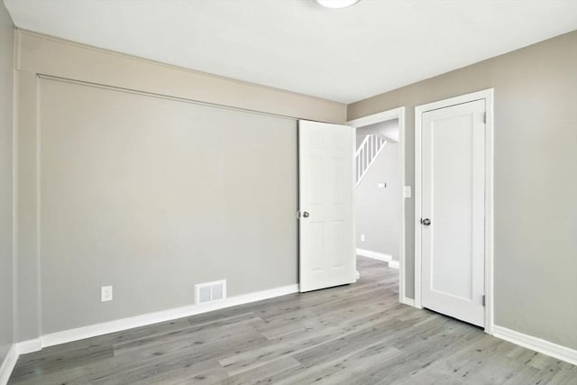 248 Pheland St, Springfield, MA 01109 - unfurnished bedroom featuring light wood-style flooring and baseboards