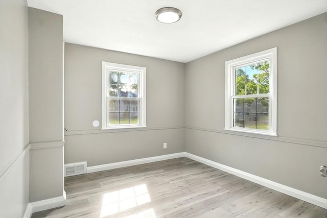 248 Pheland St, Springfield, MA 01109 - unfurnished room featuring wood finished floors and baseboards