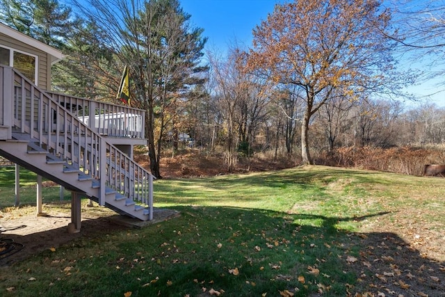 view of yard with a wooden deck