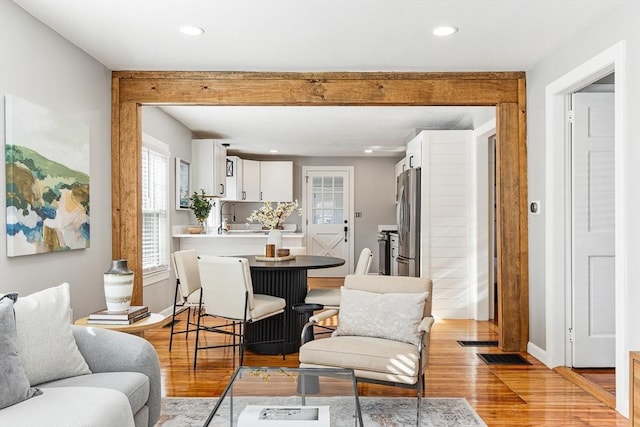 dining room with light hardwood / wood-style flooring