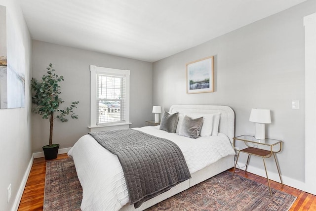 bedroom featuring wood-type flooring