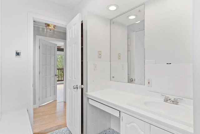 bathroom featuring vanity and wood finished floors