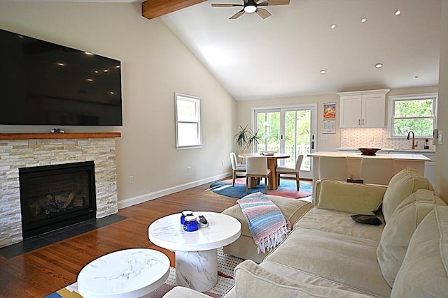 11 Edith Rd, Hudson, MA 01749 - living room with healthy amount of natural light, ceiling fan, wood finished floors, baseboards, and recessed lighting