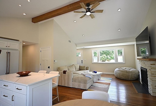 11 Edith Rd, Hudson, MA 01749 - living area featuring ceiling fan, high vaulted ceiling, beam ceiling, dark wood-style flooring, and a fireplace