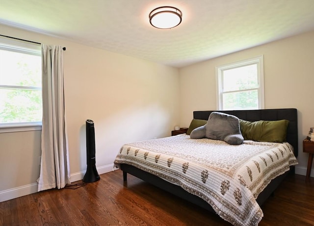 11 Edith Rd, Hudson, MA 01749 - bedroom featuring multiple windows, dark wood-type flooring, and baseboards