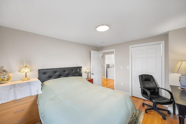 26 Weybosset St, Weymouth, MA 02191 - bedroom with light wood finished floors, a closet, and baseboards