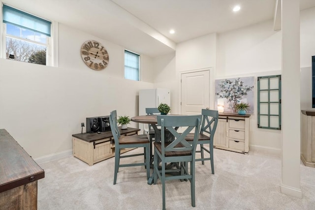 office area featuring recessed lighting, baseboards, and light colored carpet