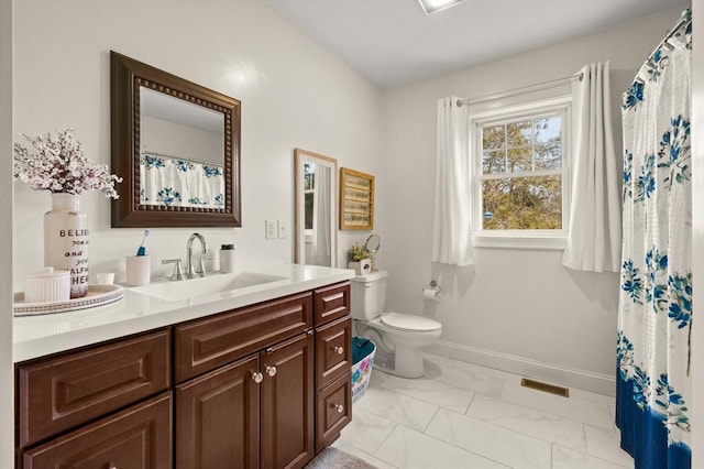 full bathroom with toilet, vanity, visible vents, baseboards, and marble finish floor