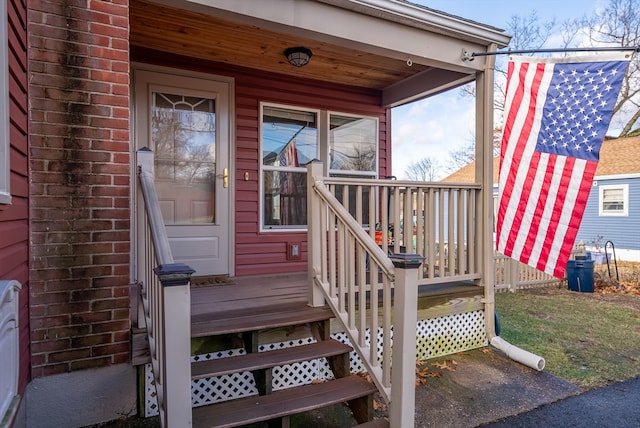 doorway to property with covered porch