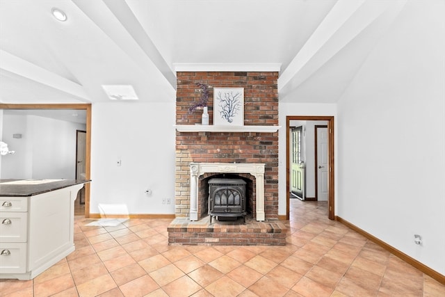 unfurnished living room featuring lofted ceiling, light tile patterned floors, and a fireplace