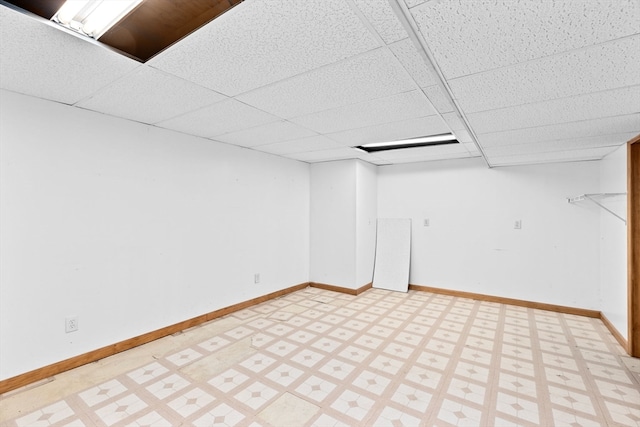 basement with a drop ceiling