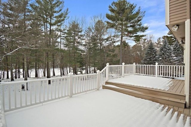 view of snow covered deck