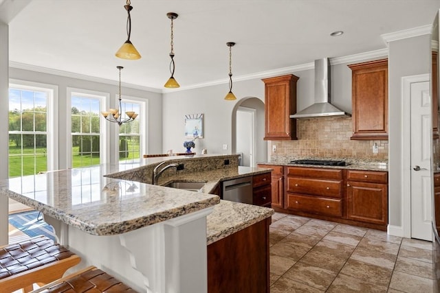 kitchen featuring a sink, wall chimney range hood, dishwasher, tasteful backsplash, and gas cooktop