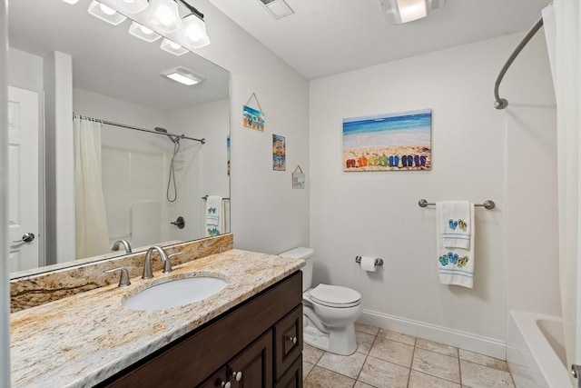 bathroom with toilet, baseboards, and vanity