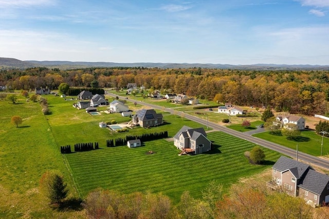 drone / aerial view of a heavily wooded area