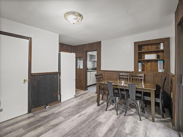 dining room with light wood finished floors