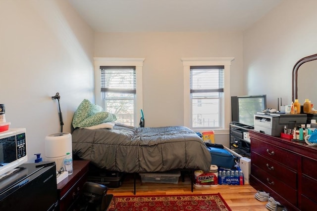 102 Gilman St, Somerville, MA 02145 - bedroom featuring wood finished floors