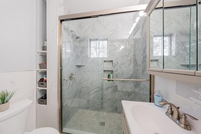 102 Gilman St, Somerville, MA 02145 - bathroom featuring toilet, a stall shower, and vanity