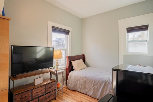 102 Gilman St, Somerville, MA 02145 - bedroom featuring multiple windows and wood finished floors