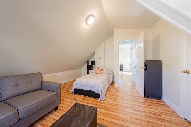 102 Gilman St, Somerville, MA 02145 - bedroom with light wood-style floors, lofted ceiling, and baseboards