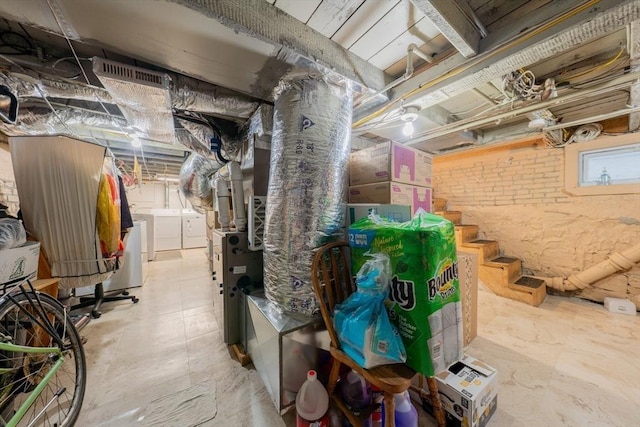 102 Gilman St, Somerville, MA 02145 - basement featuring washing machine and dryer and stairs