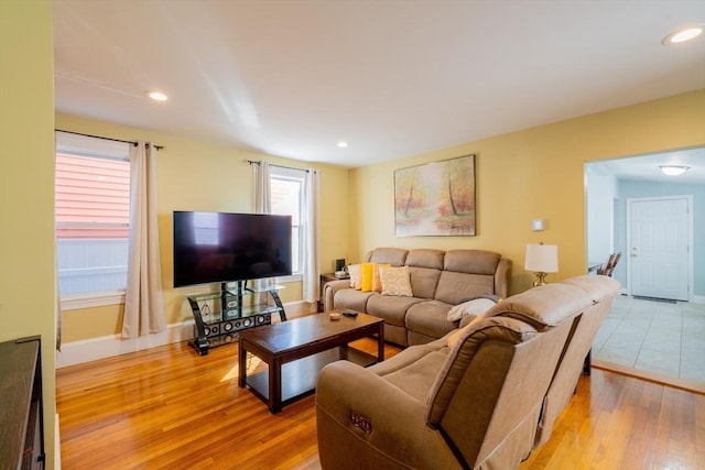 102 Gilman St, Somerville, MA 02145 - living area with light wood-style flooring and recessed lighting