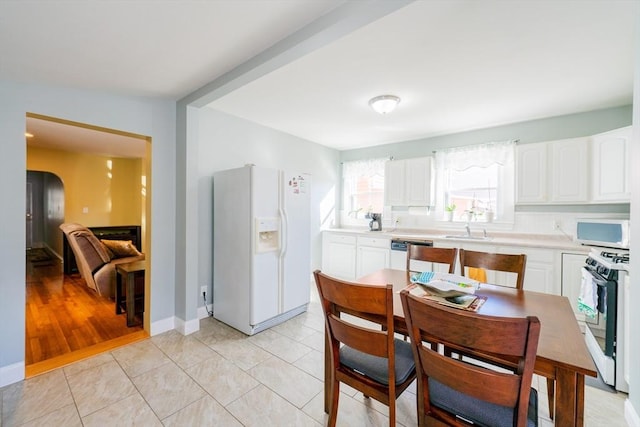 102 Gilman St, Somerville, MA 02145 - dining area featuring arched walkways