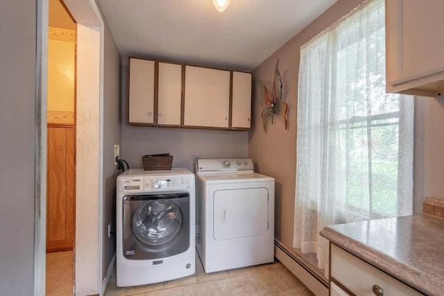 7 Prospect Ave, Dudley, MA 01571 - clothes washing area featuring cabinet space, washing machine and clothes dryer, a baseboard heating unit, and light tile patterned flooring