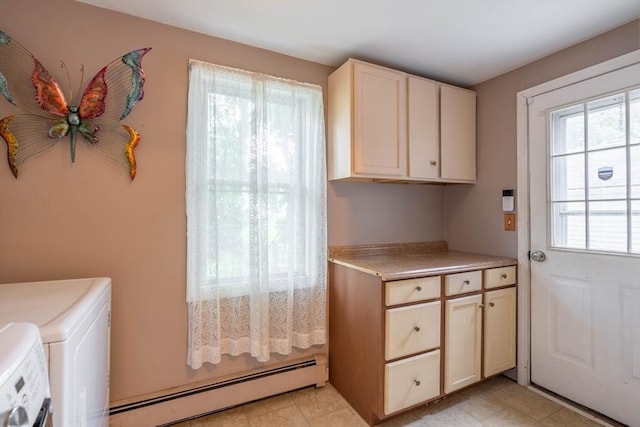 7 Prospect Ave, Dudley, MA 01571 - clothes washing area featuring a baseboard heating unit, cabinet space, and washer and clothes dryer