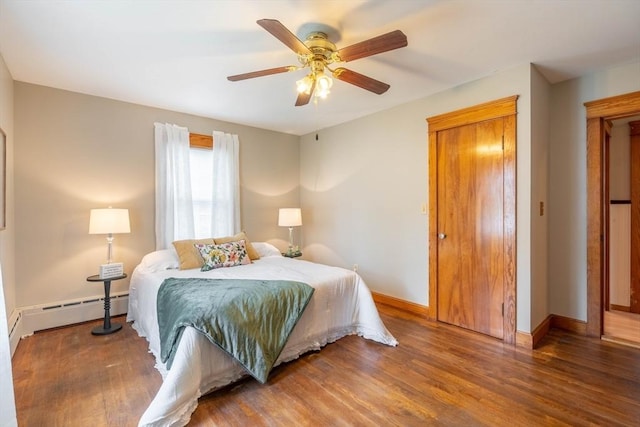 7 Prospect Ave, Dudley, MA 01571 - bedroom with wood finished floors, a baseboard radiator, baseboards, and ceiling fan