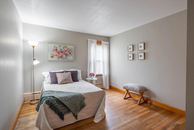 7 Prospect Ave, Dudley, MA 01571 - bedroom featuring light wood-style flooring, baseboards, and baseboard heating