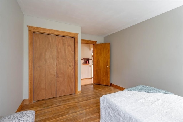 7 Prospect Ave, Dudley, MA 01571 - bedroom featuring wood finished floors, a closet, and baseboards